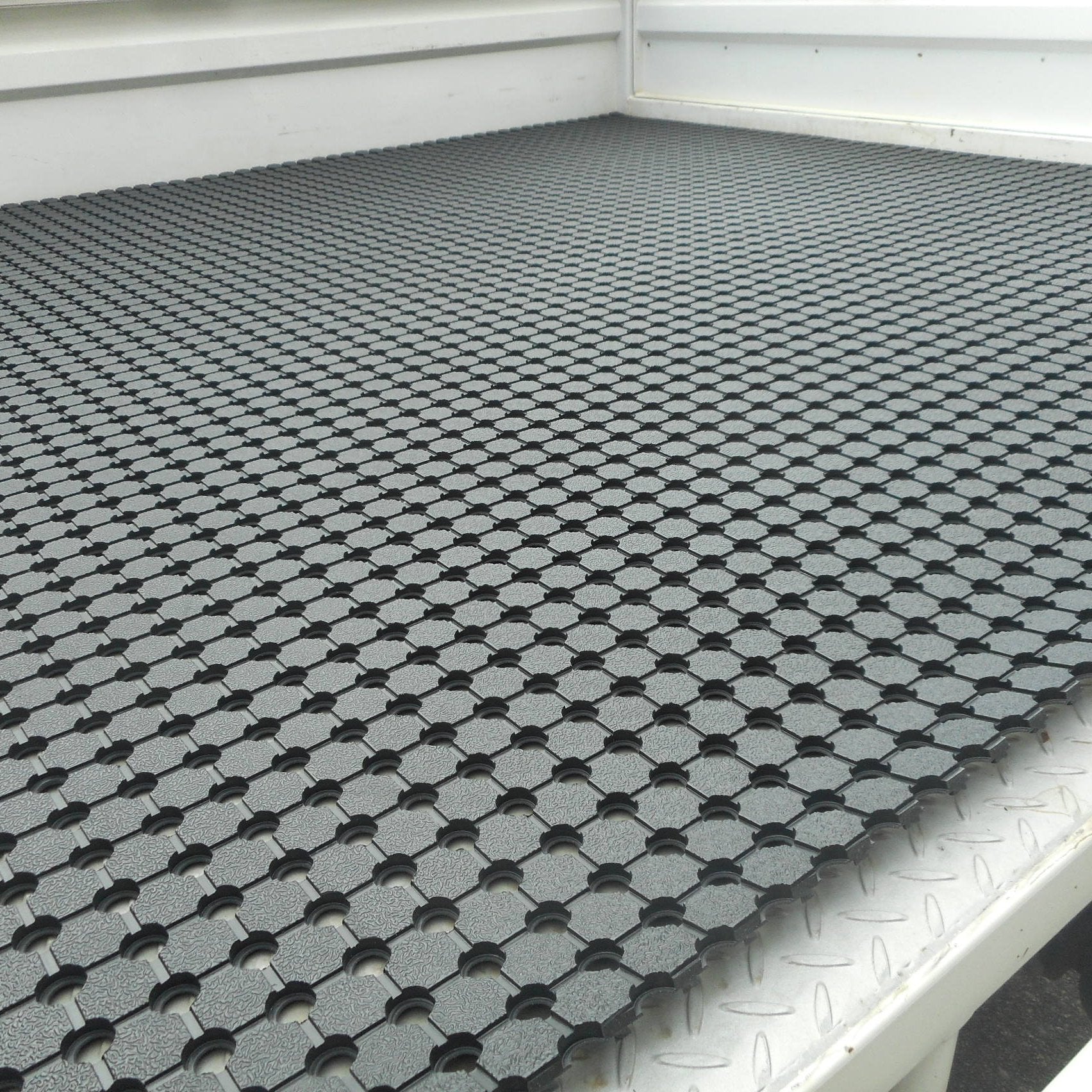 Ute Matting with holes per metre